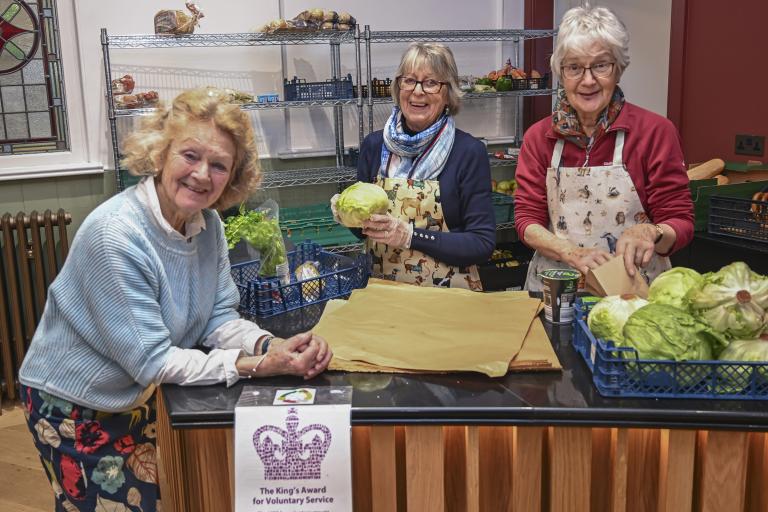 Lindsay Wrightson, Jan Anderson and Rosemary Miller of Malton Free Fridge, sorting food that would have otherwise gone to waste. 