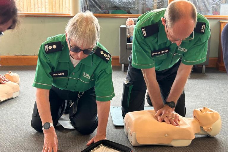 Amanda and Adrian Whitwood demonstrate first aid on a dummy.