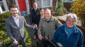executive member for highways and transport, Cllr Keane Duncan, whose portfolio includes flood protection, with some of the householders who have benefited from improved defences at their properties. From left to right, Cllr Duncan, Terry and Clare Harding, and Peter and Janice Clark