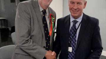 Newly elected councillor Tony Randerson with returning officer Richard Flinton.