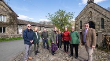Villagers outside Draughton Village Hall, near Skipton, with North Yorkshire Council’s executive member for climate change, Cllr Greg White. 