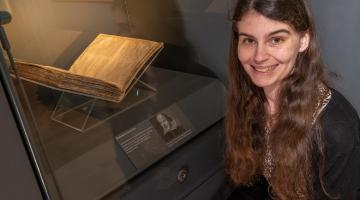 Museum and collections officer Jenny Hill, with the rare folio.