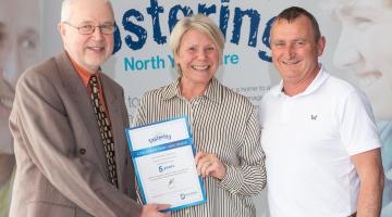 Foster carers John and Karen Pownall with North Yorkshire Council’s placement and fostering manager, Alan Tucker, at an annual conference earlier this year after being recognised for the rewarding work they do. 