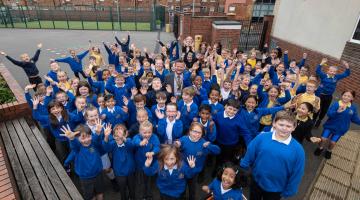 Students from Gladstone Road Primary School celebrating