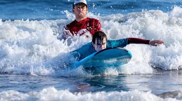 Two people on surf boards