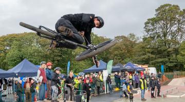 A cyclist trying out the new skate park in front of crowds at the official opening event on Saturday. 