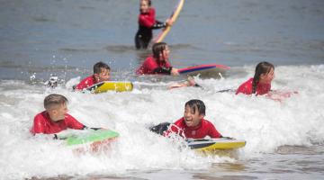 Children on surf boards