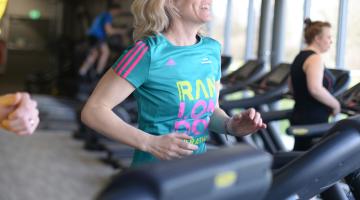 A lady running on a treadmill