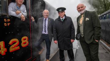 : From left, train driver Adrian Landi, North Yorkshire Council’s executive member for the visitor economy, Cllr Derek Bastiman, station staff Allan Langham, and VisitEngland’s director, Andrew Stokes, pictured at the North Yorkshire Moors Railway’s station in Pickering. 