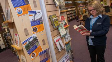 North Yorkshire libraries’ library assistant, Jo Madgwick, looks over the Holocaust Memorial Day display at Northallerton Library