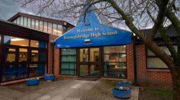 A photo of the front reception door to Boroughbridge High School.