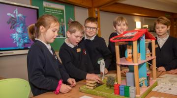 Boroughbridge Primary School pupils who were awarded with the coveted Eco-Schools Green Flag Award for their commitment to sustainability and climate change enjoy the activities held. 
