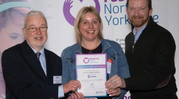 Claire and Jonathan Graham were honoured for their five years of fostering service.