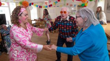 Three people dancing