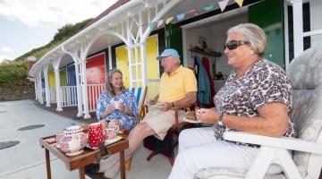 Martin and Jenny Johnson and their daughter, Lisa, enjoy one of the new chalets.