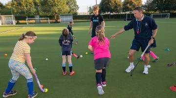 Children playing hockey