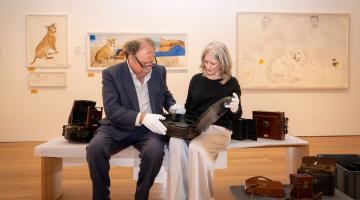 North Yorkshire Council’s executive member for culture, Cllr Simon Myers, checks out exhibits at the Mercer Gallery in Harrogate with exhibitions curator, Karen Southworth.