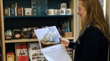 Beccy Roberts, library supervisor, looking at a calendar