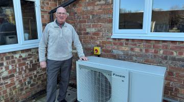 Kirkby Fleetham resident David Fielding with a heat pump