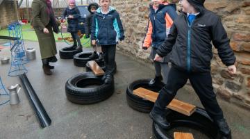 The playground for children in Reception and Year 1 at Masham Church of England Voluntary Aided Primary School, has undergone a revamp replacing an “old and tired” area into a new and exciting space for the youngsters to enjoy. Also pictured is Cllr Annabel Wilkinson.