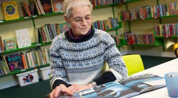 Heather Woolley in a library