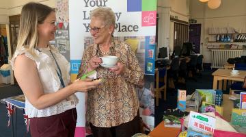 Area librarian Catherine Barlow (left), and library visitor Enid Cheetham. 