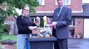 Cllr Richard Foster with North Yorkshire resident, Alexis Flint, demonstrating what can be recycled. 