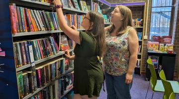Kaitlin and Liz Clarkson in the library
