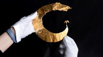 Image of the gold lunula, a nationally significant Bronze Age find.