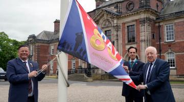Left to right, Armed Forces champion, Cllr Kevin Foster, vice-chair, Cllr George Jabbour, and council, Cllr Carl Les, at the flag-raising event at County Hall in Northallerton to mark the 80th anniversary of VE Day.