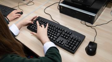 School student using a computer