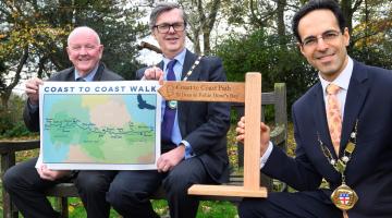 The chair of North Yorkshire Council, Cllr George Jabbour, is joined by his counterparts from Cumberland Council and Westmorland and Furness Council, Cllr Andy Semple and Cllr Doug Rathbone, at County Hall in Northallerton to champion the Coast to Coast Walk which crosses the three areas.