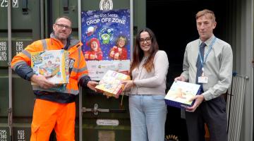 Three people at the household waste recycling centres with used toys