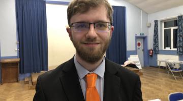 A photo of Andrew Timothy