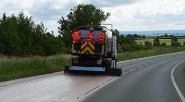 A new highways treatment being applied to the road