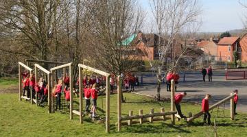 Children playing on a play area