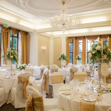 Table plan with chairs set out for a wedding meal.