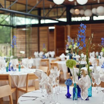 Tables and chairs set out with decorations.