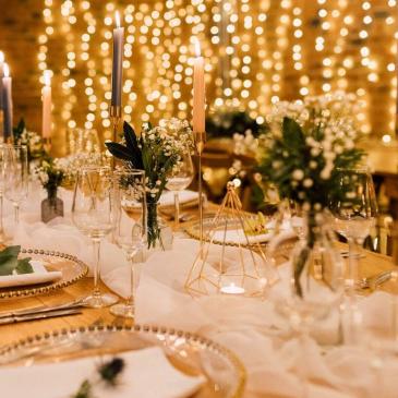 Tables set out for a wedding meal.