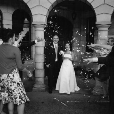 Bride and groom walking out in front of all their guests after the ceremony.