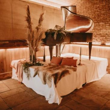 A piano in a romantic setting at the Tan Hill Inn. 