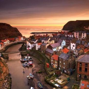 A view of Staithes at sunset