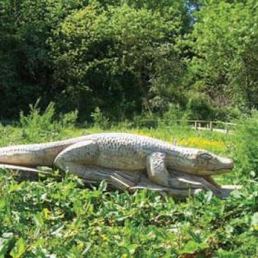 Stone crocodile sculpture in Quarry Mount park