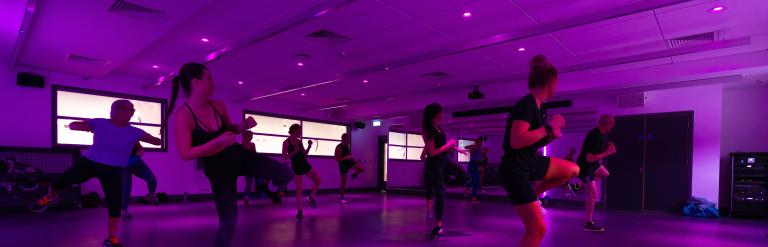 A group taking part in a fitness class at Harrogate Leisure and Wellbeing Hub