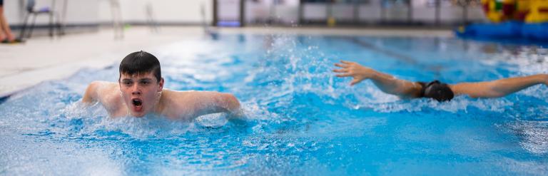 Two people swimming at Knaresborough Leisure and Wellbeing Hub