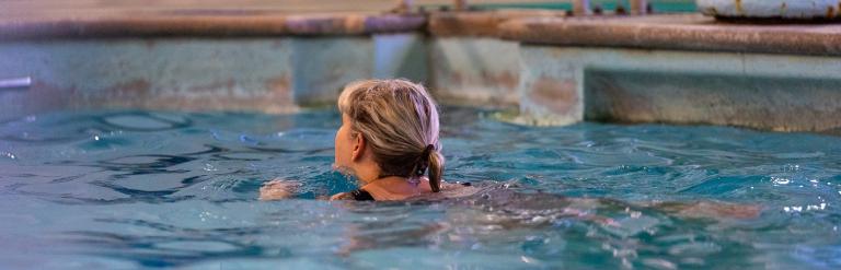 A woman swimming in Starbeck Swimming Pool