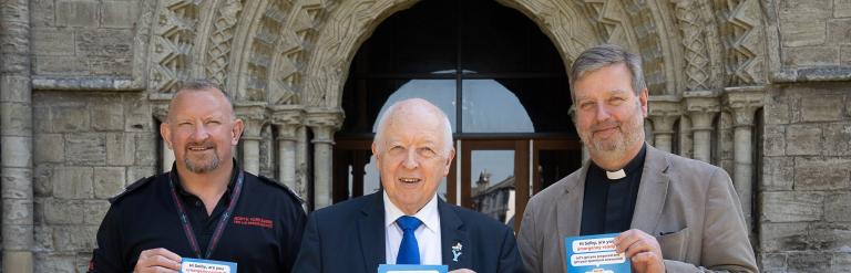 Photo of the group manager for North Yorkshire Fire and Rescue Service, Tony Peel, North Yorkshire Council’s leader, Cllr Carl Les, and Vicar of Selby Abbey, Revd Canon John Weetman