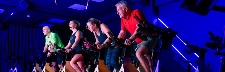 Small group of adults in a cycling exercise class