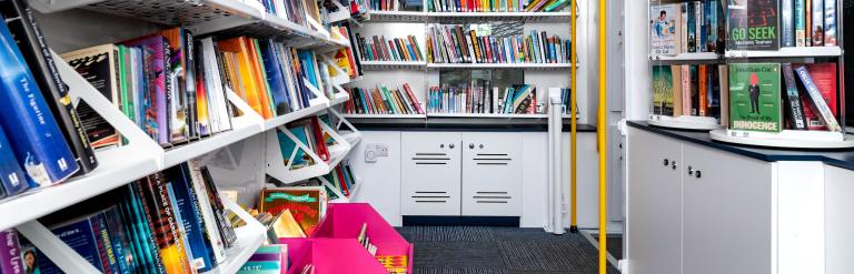 A look inside the mobile library with its many books.