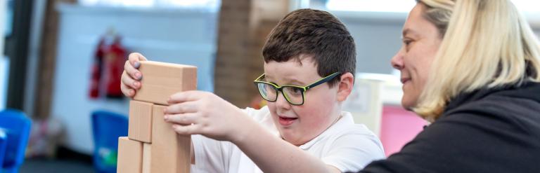 Keenan playing Jenga